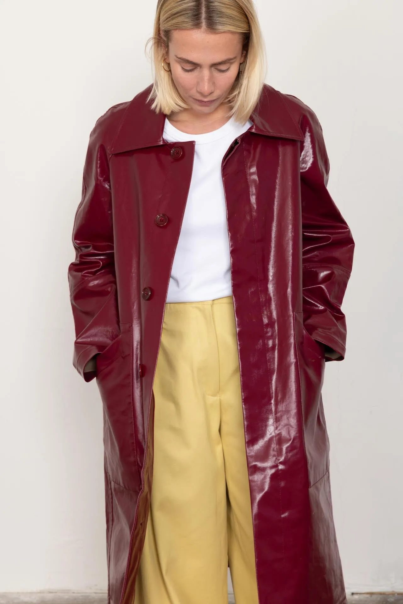 Burgundy patent car coat